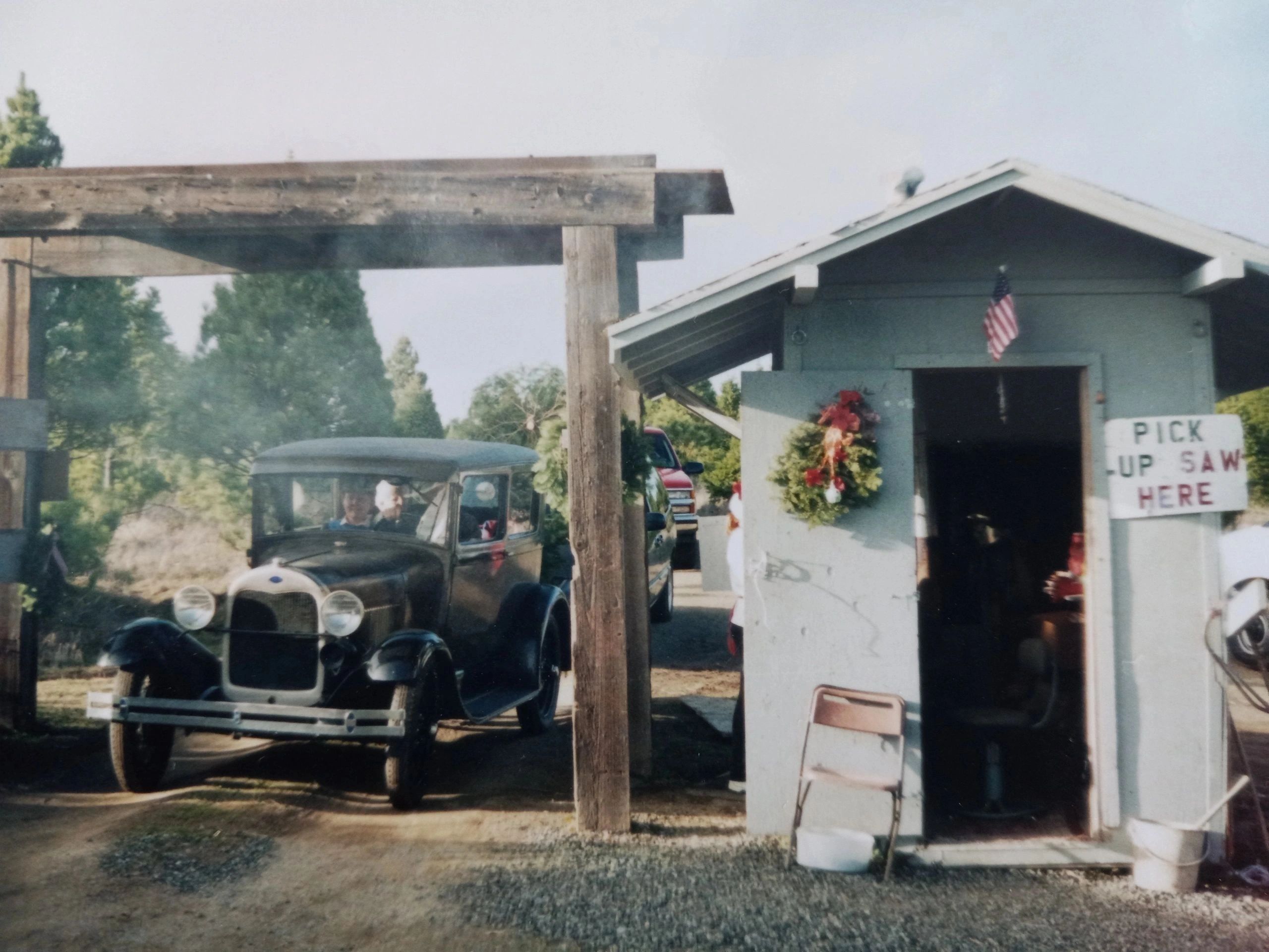 Skyline Ranch's rustic saw shed and vintage car